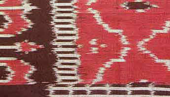 

   Ikat fabric, «saree» design,   
   burgundy (detail)

