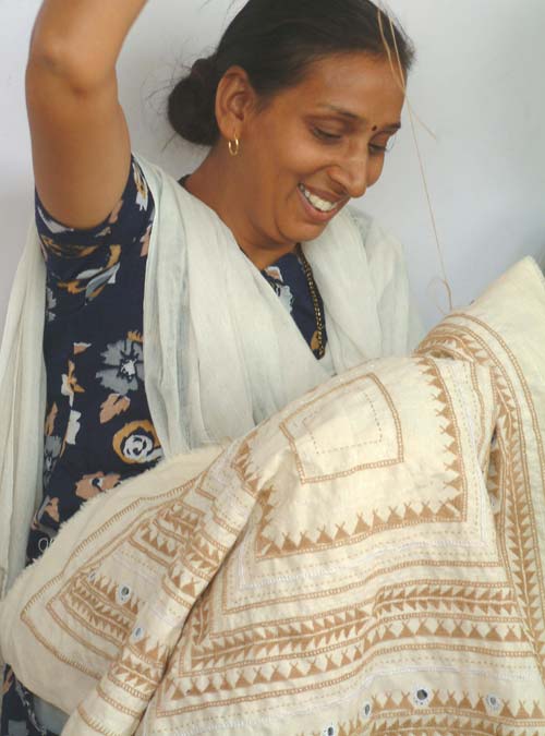 

   Kathiawadi embroiderer of
   Onevillage.com Ahmedabad cushion cover   

   Please click to next picture
 
