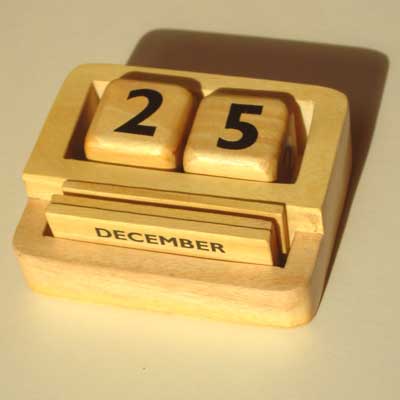 

   11427
   Cubes perpetual calendar

   Arrange the wooden cubes and tickets   
   to show any date of any year.
 
