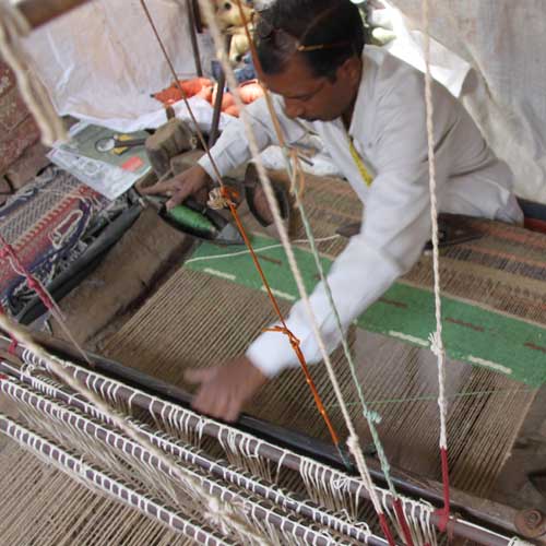 

   A weaver creates   
.
